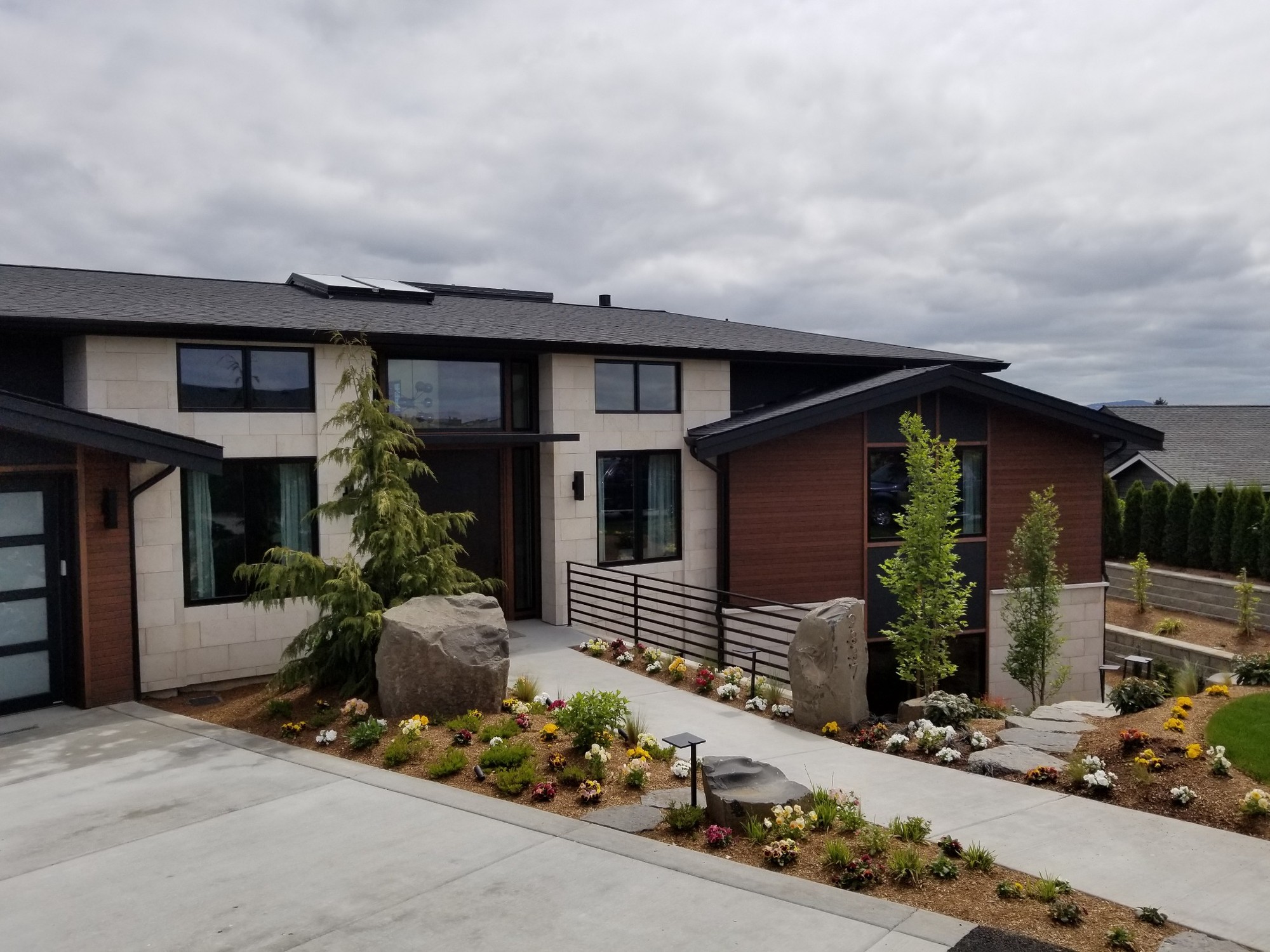 Contemporary Stone & Masonry Home - Architectural Stone Veneer System